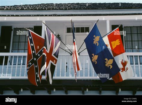 A Home Displays The Five Flags Confederate British American French