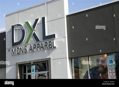 A Logo Sign Outside Of A Destination Xl Dxl Retail Store Location In