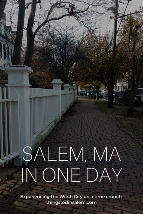 A White Picket Fence With The Words Salem Ma In One Day On It S Side