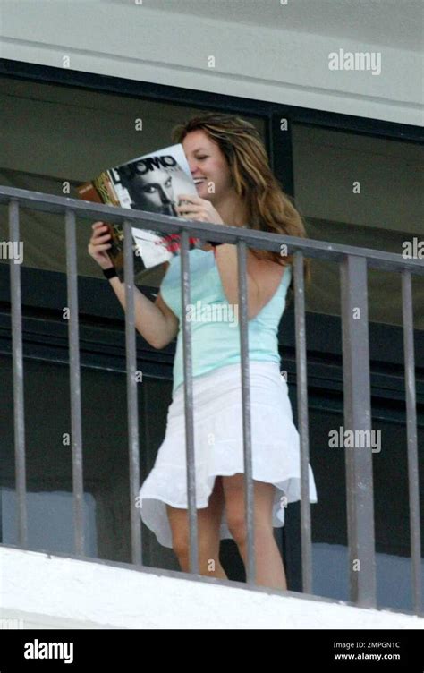 Britney Spears Shows Off Her Husbands Amp 39 L Amp 39 Uomo Magazine Shoot To Waiting Photographers From Her