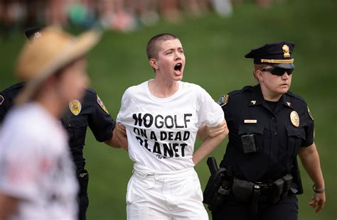 Climate Change Protestors Disrupt Travelers Championship After Storming 18Th Green Before