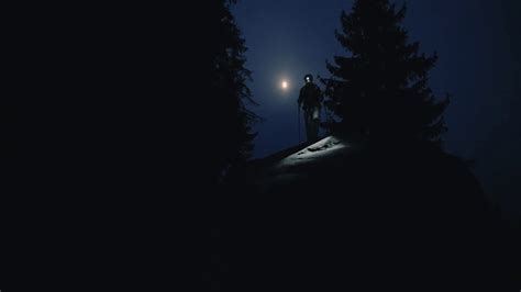 Close Up Man Walk Hiking Through A Dark Rocky Mountains Shining Through