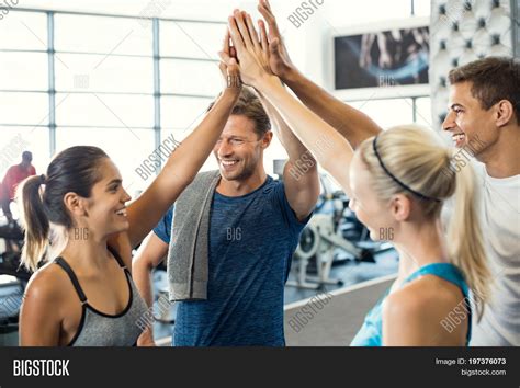 Couple Exercise And High Five Together For Teamwork At Gym And Fitness