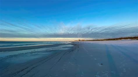 Destin Florida Beach At Sunset With Radiating Cirrus Clouds Stock