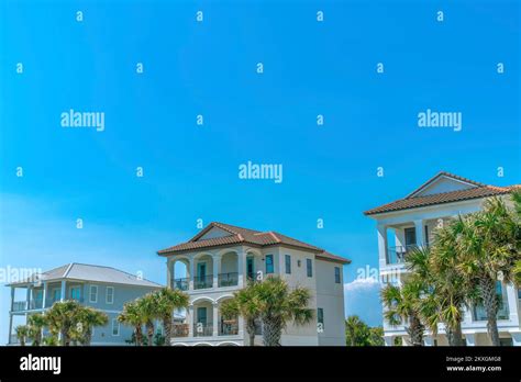 Destin Florida Front Exterior Of Beach Homes Against The Blue Sky