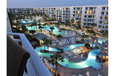 Evening View Of The Pools And Lazy River At Waterscape Family Beach