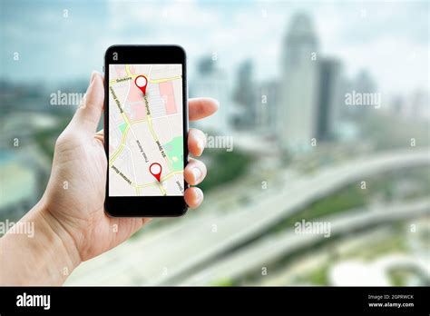 Hand Using A Smartphone Holding Gps Map To Route Destination Network