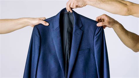 How To Fold And Pack A Suit The Right Way Gq Youtube