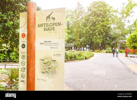 Informational Visitor Sign Pointer To Tourist Destinations In Berlin Zoo Editorial Stock Image