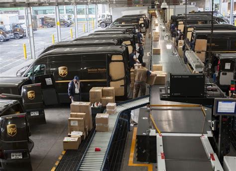 Inside A Ups Sorting Facility Ups Delivery Parcel Delivery Party