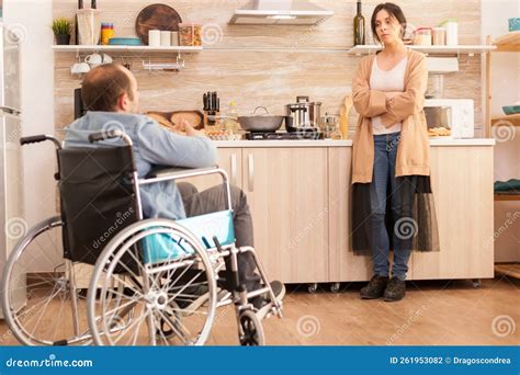 Irritated Wife In Kitchen Stock Photo Image Of Wheelchair 261953082