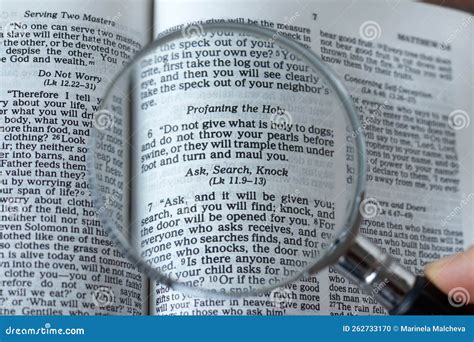 Magnifying Glass Over Open Holy Bible Book Close Up Ask Search Knock Verse Matthew 7 7