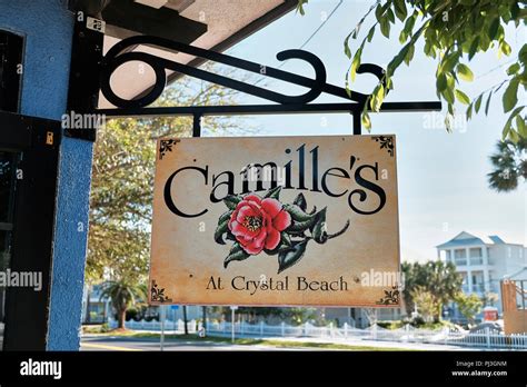 Outside Exterior Advertising Sign For Camille S Restaurant And Bar At