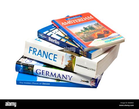 Stack Of European Travel Guide Books On White Stock Photo Alamy