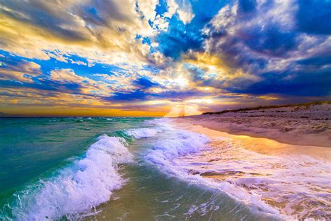 Sunrays Breaking Over Blue Sea Destin Florida Sunset Photograph By