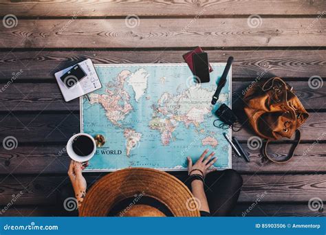 Tourist Exploring The World Map Stock Photo Image Of Vacation Guide