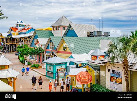 Tourists Walking Among The Shops At Harbor Walk Marina Destin Florida