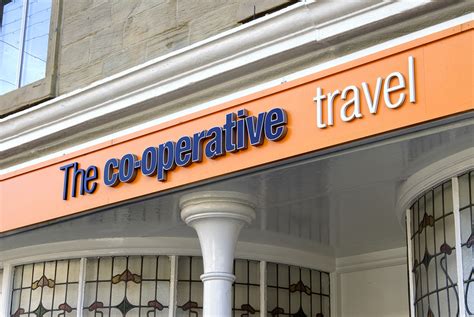 Travel Agent Investigating The Travel And Tourism Industry