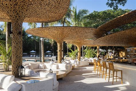 Various Associates Tops Chinese Beach Club With Bamboo Canopies