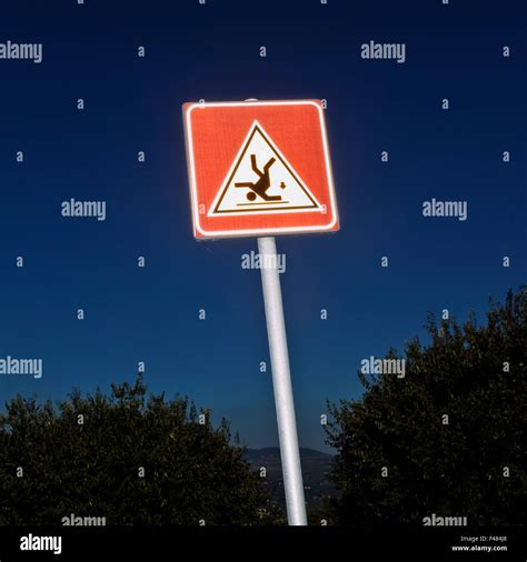 Warning Sign Against A Blue Sky Italy Stock Photo Alamy