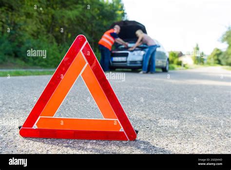 Warning Triangle Set Up Because Of A Breakdown With A Car Germany