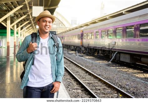 Young Asian Male Traveler Backpack Train Stock Photo 2229370863