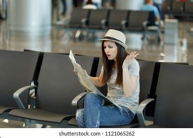 Young Irritated Traveler Tourist Woman Holding Stock Photo 1121065262