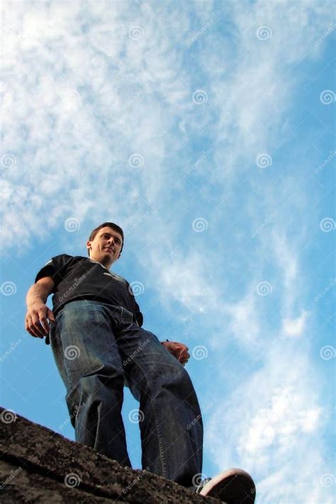 Young Man Stays On The Stone Edge Stock Image Image Of Outdoor Edge 11606785